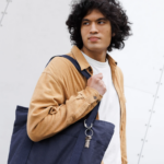 Orbitkey Clip Mini attached to a bag